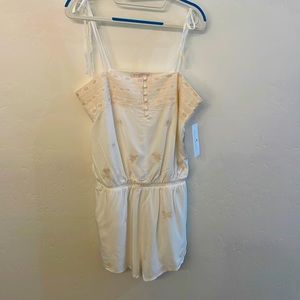 Cream romper. Spiritual gangster brand new.
